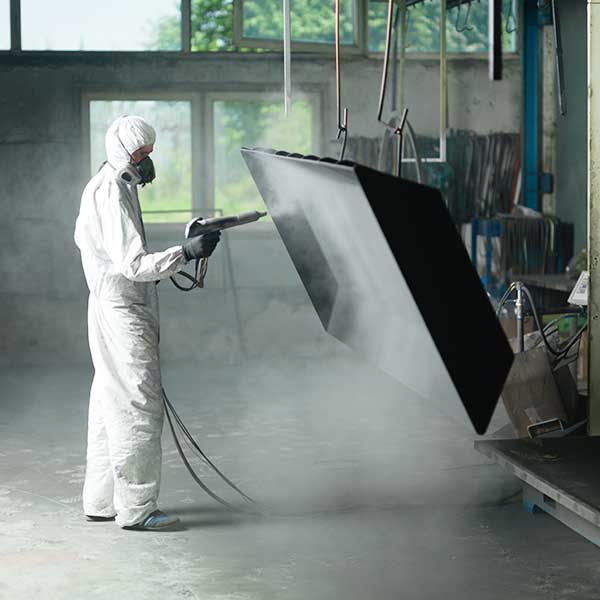 Worker at Eco-clean in Atlanta, GA, providing high-quality powder coating services