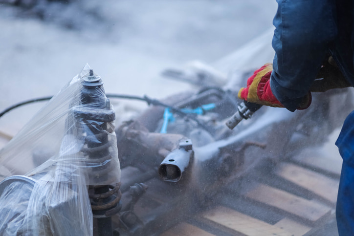 Industrial metal stripping process before powder coating application in Atlanta, GA